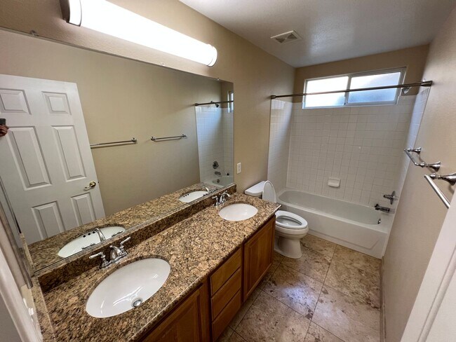 Building Photo - **COMING SOON** UPGRADED 5BD/3.5BA SUMMERLIN HOME W/ POOL!