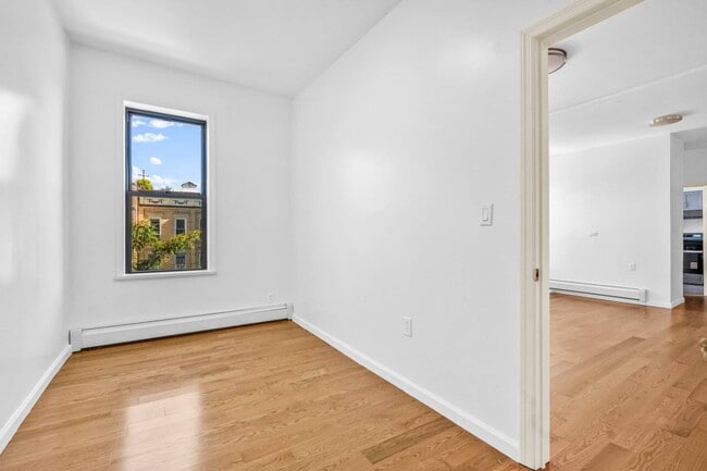 Building Photo - 71-32 Fresh Pond Rd