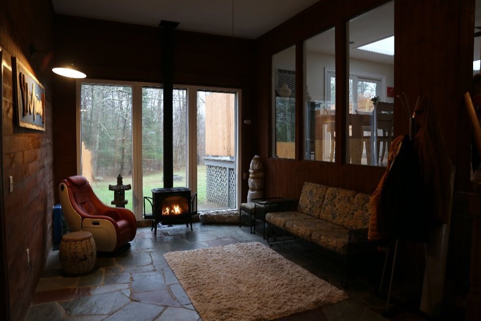 Entry room w/ gas fireplace - 131 Mill Ln