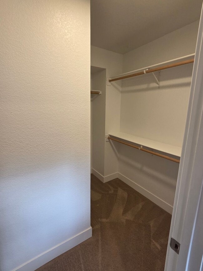 Building Photo - STUNNING 4-LEVEL TOWNHOME IN HIGHLANDS WITH SAUNA, 2-CAR GARAGE + AMAZING ROOFTOP DECK!