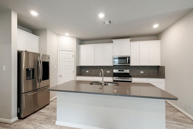 Building Photo - Where Style Meets Function in a Prime Setting