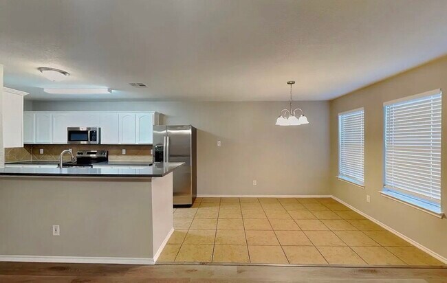 Building Photo - A Place to Settle In: Inviting 5-Bedroom Family Home