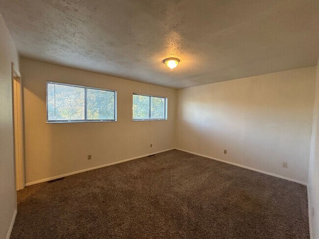 Building Photo - Beautiful Split-Level 6BR Home with Attached Garage and Fenced Yard +$300 Off First Month!