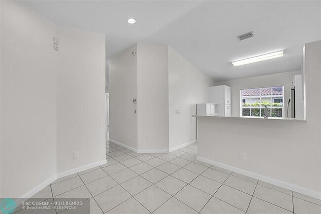 Building Photo - 5642 NW 118th Dr