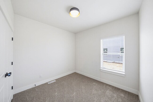 Building Photo - 445 E River Rd
