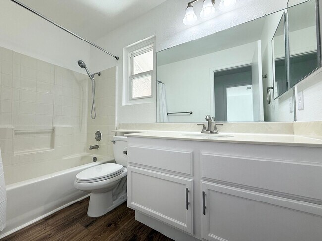 Building Photo - Corner Lot Beauty with Open Living, Guest Suite Down & Expansive Backyard