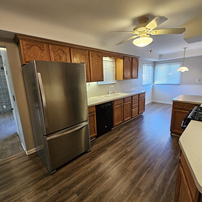 Building Photo - 3 Bedroom, 1.5 Bath Brick Ranch. Huge Great Room and Living Room. Big Kitchen, Backyard with Deck...