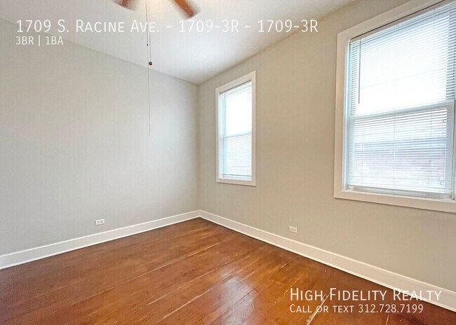 Building Photo - 1709 S Racine Ave