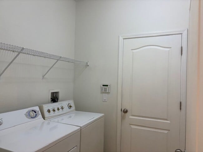 Building Photo - Water View 4/3 in Wyndham Lakes Estates near Lake Nona Medical City and O.I.A.