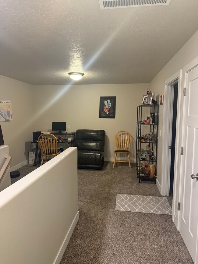 Building Photo - Three Bedroom Available