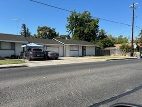 Building Photo - **BE330-Esquivel, H
