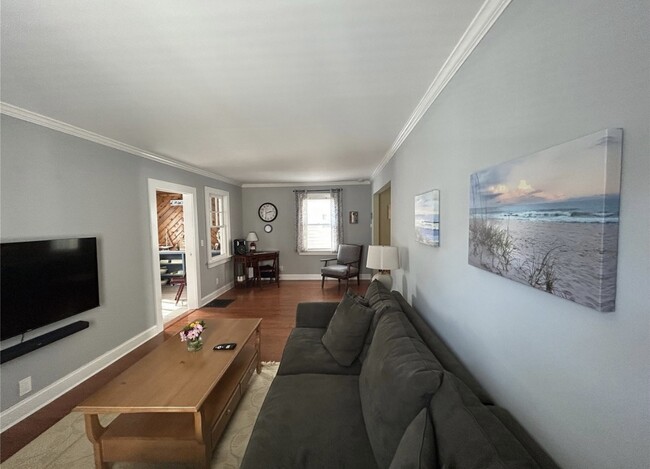 Living room facing workspace - 23 Locust Ave