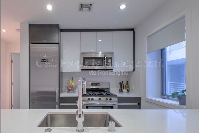 Building Photo - 7857 W Manchester Ave