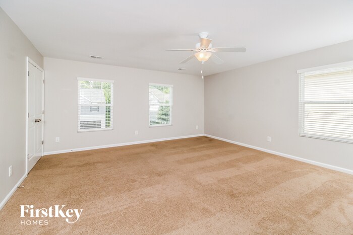 Building Photo - 6608 Championship Dr