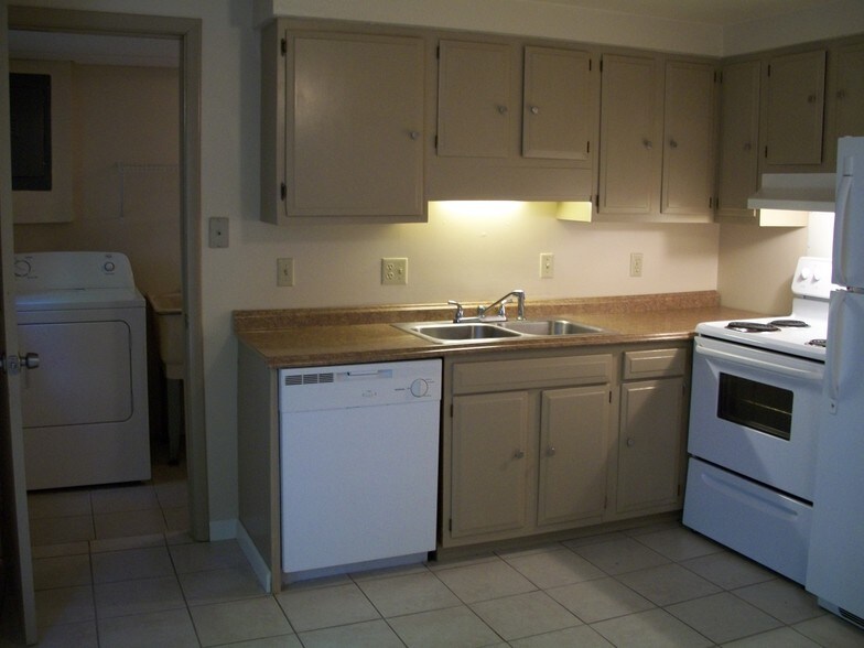 Separate laundry room off of kitchen. - 206 Chateau Ln
