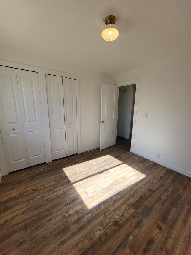 Building Photo - Free May rent with 1 Year Lease - Fully Remodeled with Garage & Yard Care Included