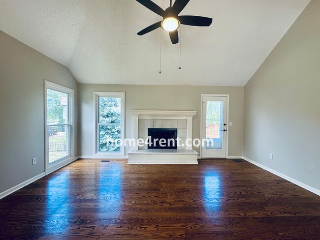 Building Photo - Brand New Paint, Wood Floors, Walkout Fini...