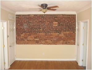 Living room exposed brick - 1504 A St NE