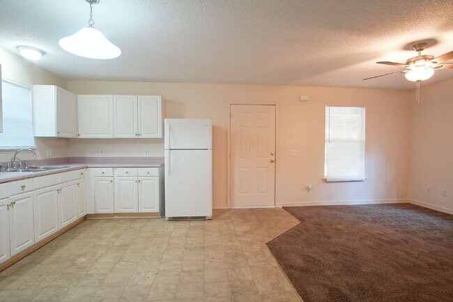 Building Photo - Pace 3BR Patio Home with Fenced Backyard & Open Floor Plan