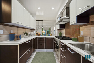 Large-Size Kitchen with Stainless-Steel Appliances and Ample Cabinet Storage - Sweetzer on Third by Wiseman