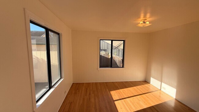Building Photo - This two-bedroom, one-bath home in Upper Seaside