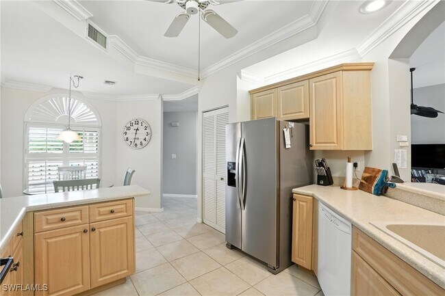 Building Photo - 7032 Pelican Bay Blvd