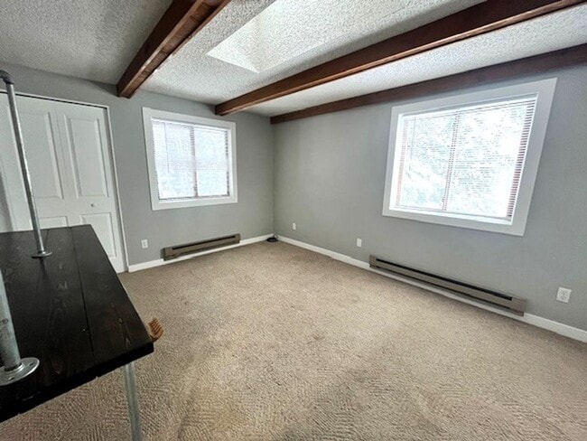 Building Photo - Long Term Rental- Creekside Condominiums #20C - UNFURNISHED