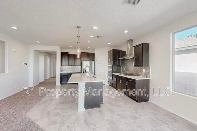 Building Photo - 6405 Kings Cyn Cv NE