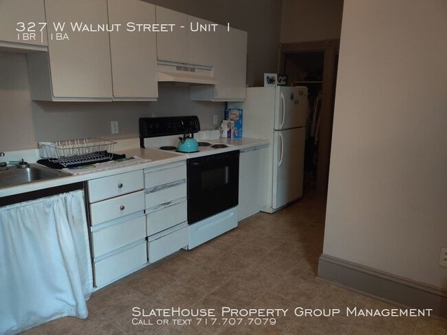 Building Photo - Quaint Walnut Street Apartment!