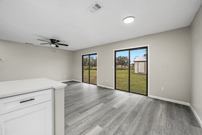 Building Photo - Charming Palm Bay Retreat - Perfect for Relaxation and Entertainment!