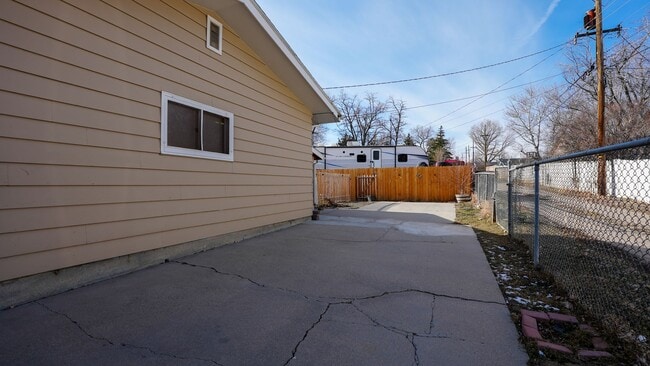 Building Photo - Comfort & Convenience: 3BR Home with Garage, RV Parking, and Flex Room