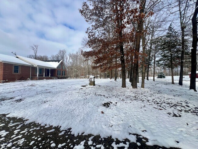 Building Photo - Gorgeous brick home with room to roam!