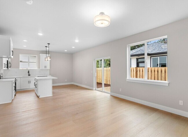 Building Photo - Beautiful New Construction 4-Bedroom Home with a Main-Level Bedroom, Designer Finishes, Attached ...