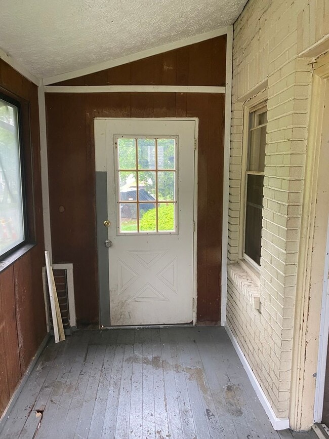 Building Photo - One Bedroom Duplex with off street parking and private enclosed porch