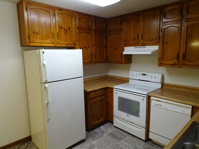 Building Photo - Great location, large wooded and fenced ya...