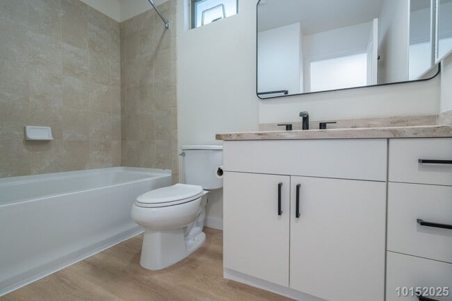 Building Photo - Available now!  Beautifully upgraded 4-bdr...