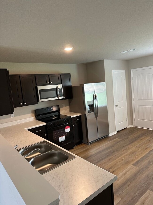 Building Photo - Pre-Leasing Now! Discover Spacious Living in This 4-Bedroom, 2-Bath Cabot Home