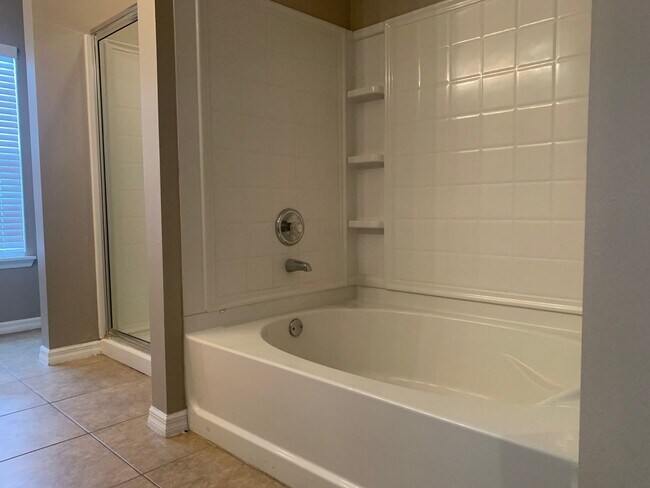 Building Photo - MOVE IN SPECIAL- 3/2 Condo w/ 2 Car Garage...