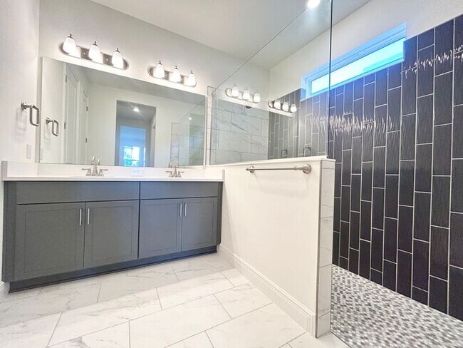 Building Photo - Gorgeous 4/3 Residence with a Private Back Lanai and a 3 Car Garage in the Delightful Laureate Pa...