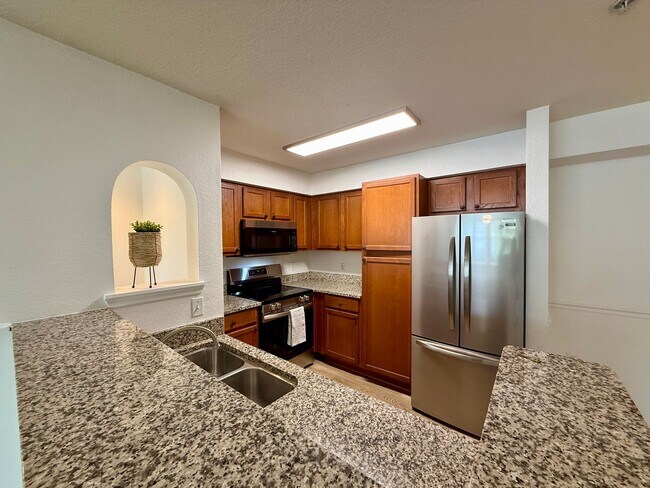 Building Photo - Bright and updated 3-bedroom, 2-bath condo