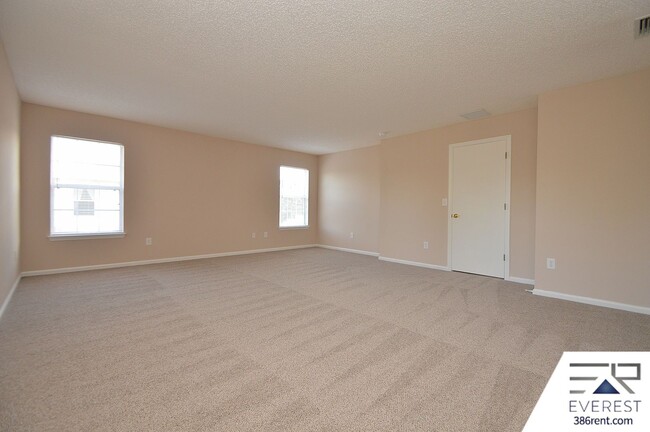 Building Photo - SPACIOUS, FULLY FENCED 4/2.5/2 IN DESIRABLE MATANZAS WOODS