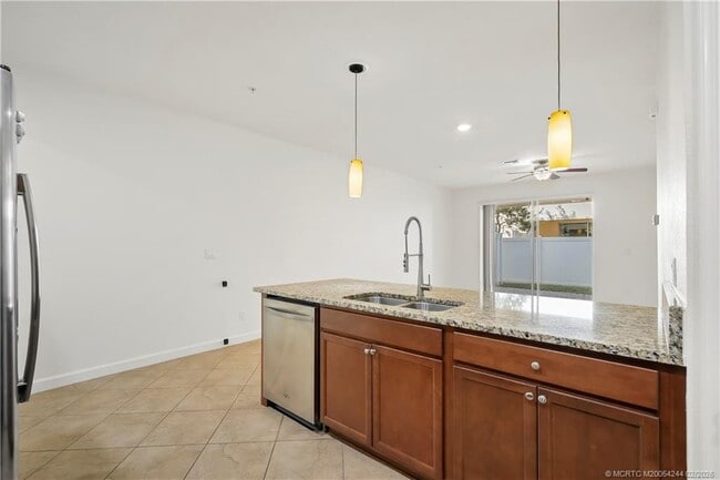 Building Photo - 9512 SW Merlin Ct