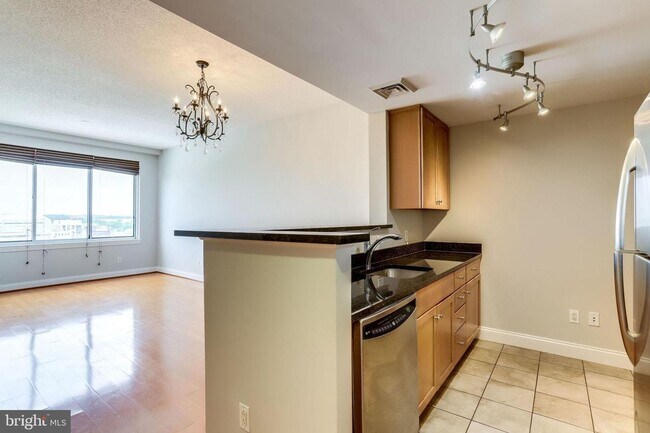 Building Photo - Modern 1BR Condo at The Phoenix with Premi...