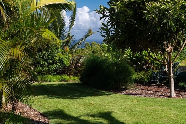 Building Photo - Elevated Haiku Retreat with Ocean Views, Designer Finishes & a Lush Edible Garden Sanctuary