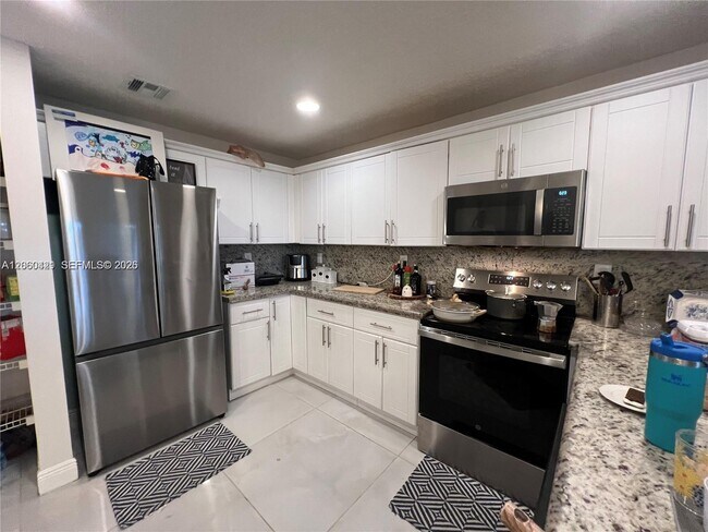 Building Photo - 11612 NW 50th Terrace