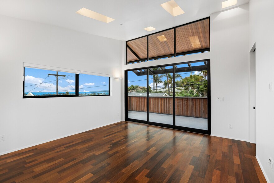 Beautiful living space opens to a wrap around outdoor patio. - 4640 Del Monte Ave