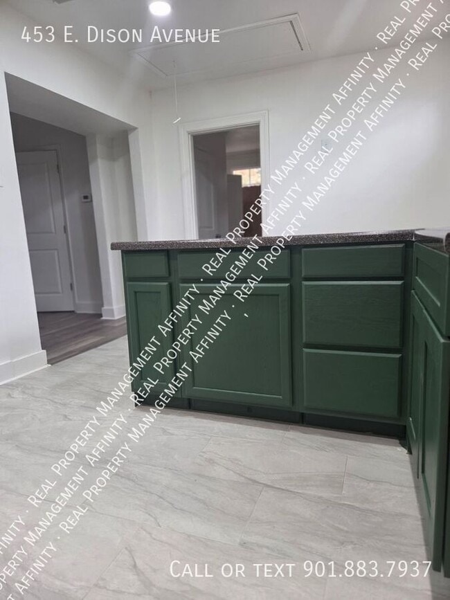 Building Photo - 453 E Dison Ave