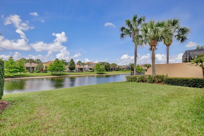 Building Photo - Gorgeous 2/2 + Den Mediterranean Villa with Waterfront Screened Patio and 2-Car Garage in the Pre...