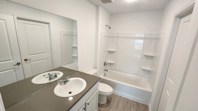 Building Photo - VIDA SUBDIVISION / San Antonio A&M steps away- spacious 4-bedroom, 2-bathroom house