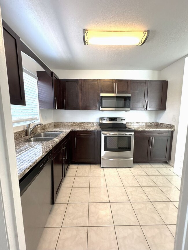 Building Photo - For Rent Beautiful 4-Bedroom Home with Bon...